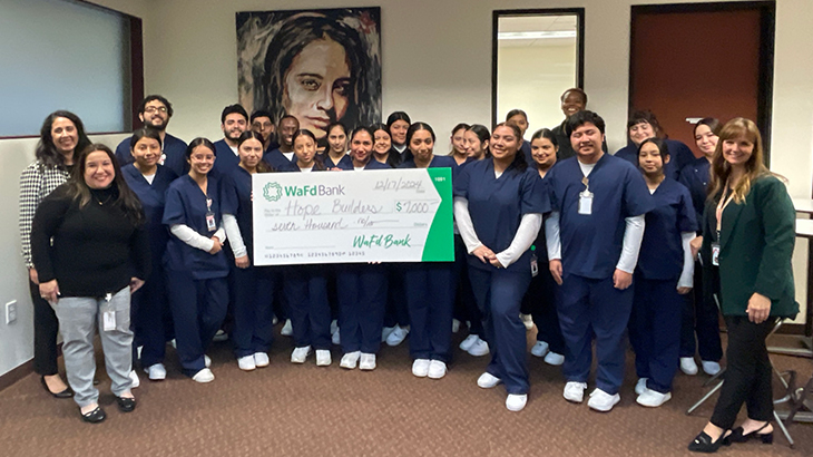 WaFd Bank Santa Rosa branch team presenting $7,000 check to Hope Builders.