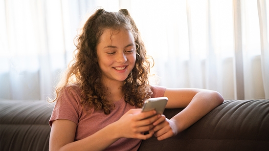 Teen girl on her cell phone.