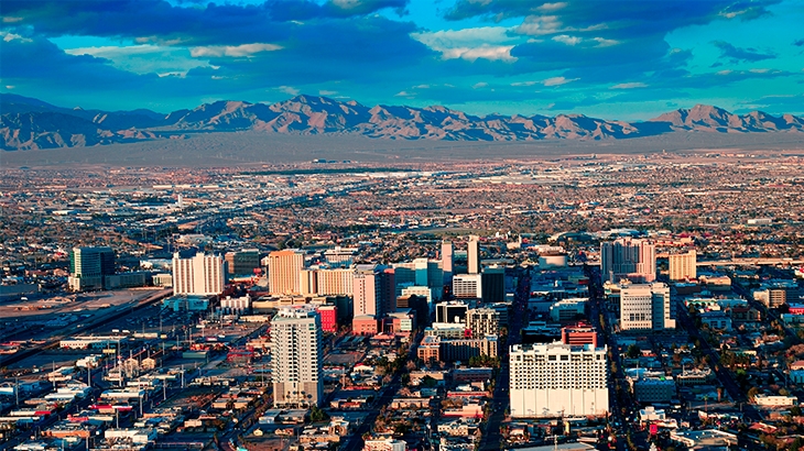 Las Vegas skyline aerial view with mountains.