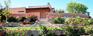 New Mexico home with spring flowers.